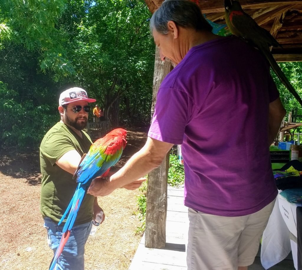 two men and parrot