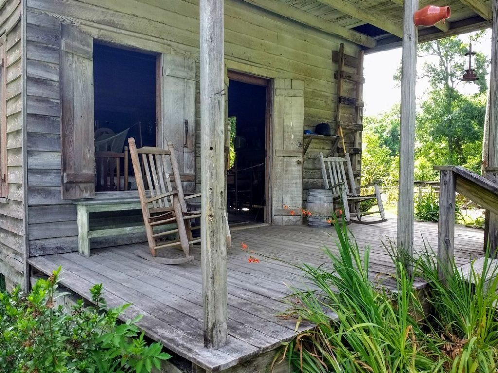 front porch Acadian farmhouse